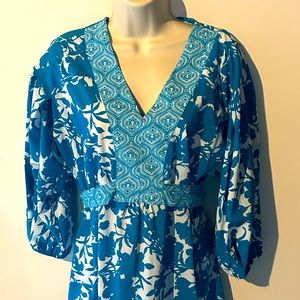 George blouse with belt that ties in the back.